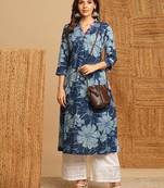 A-line kurta in dhabu print with hand embroidery detailing.