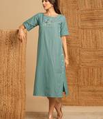 Embroidered a line dress in cotton stripe fabric with button detailing.