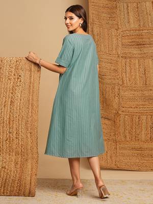 Embroidered a line dress in cotton stripe fabric with button detailing. 2