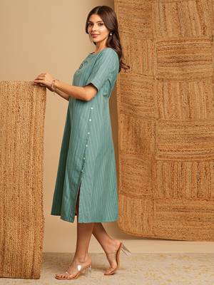 Embroidered a line dress in cotton stripe fabric with button detailing. 3