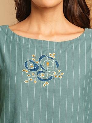 Embroidered a line dress in cotton stripe fabric with button detailing. 4
