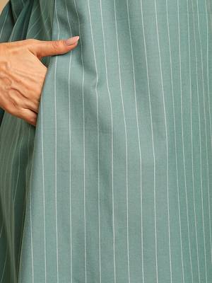 Embroidered a line dress in cotton stripe fabric with button detailing. 5