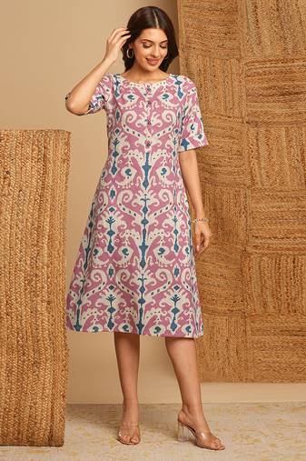 A-line cotton ikat dress with front placket and buttons on front.