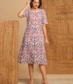 A-line cotton ikat dress with front placket and buttons on front.