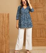 Cotton dhabu print top with gathering and hand embroidery.