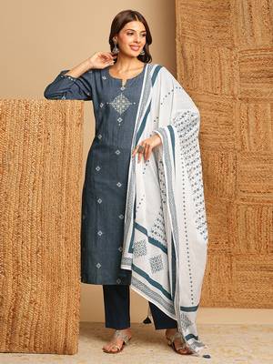 Dobby straight suit set with minimal block print and hand work. 1