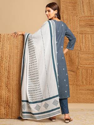 Dobby straight suit set with minimal block print and hand work. 2