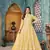 Yellow embroidered net semi stitched anarkali suit