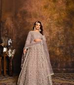 Purple embroidered net semi stitched anarkali suit