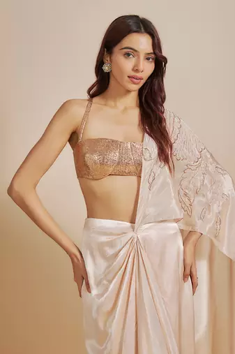 Peach skirt saree with rose gold blouse