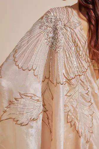 Peach skirt saree with rose gold blouse