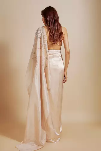 Peach skirt saree with rose gold blouse