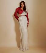 Red blazer with beige saree with embroiderd belt