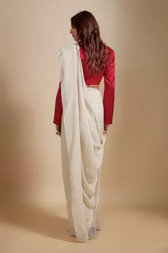 Red blazer with beige saree with embroiderd belt