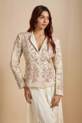 Beige tissue jacket with cream dhoti