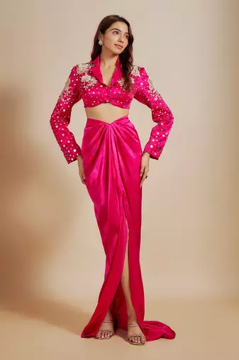 Hot pink emboriderd blazer with hot pink dape skirt