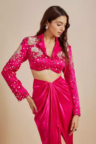 Hot pink emboriderd blazer with hot pink dape skirt