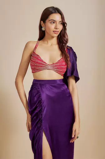 Red emboiderd bloue with purple skirt & drape