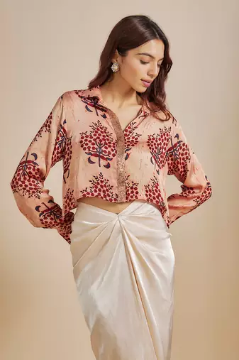 Peach printed  shirt with cream skirt