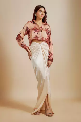 Peach printed  shirt with cream skirt