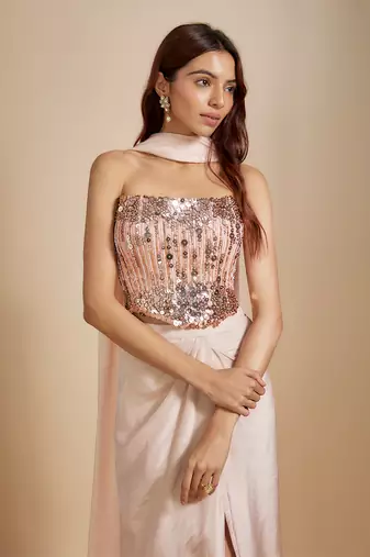 Peach embroidered corset with rose gold skirt