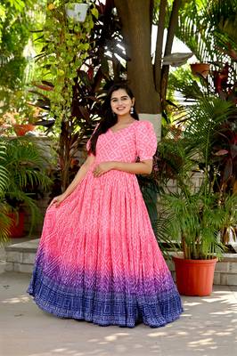 Indiatellme pink chinnon bandhej print gown with crush pleating, puff sleeves, and  v neck 1