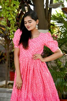 Indiatellme pink chinnon bandhej print gown with crush pleating, puff sleeves, and  v neck 3
