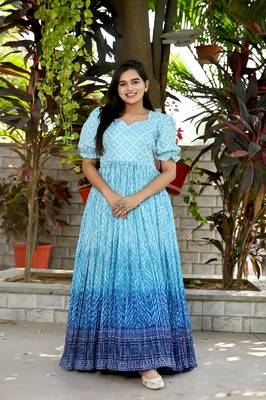 Indiatellme turquoise chinnon bandhej print gown with crush pleating, puff sleeves, and  v neck 1