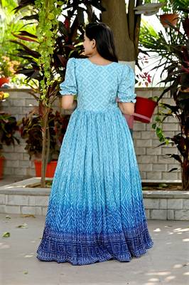 Indiatellme turquoise chinnon bandhej print gown with crush pleating, puff sleeves, and  v neck 2