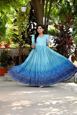 Indiatellme turquoise chinnon bandhej print gown with crush pleating, puff sleeves, and  v neck 3