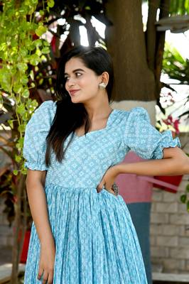 Indiatellme turquoise chinnon bandhej print gown with crush pleating, puff sleeves, and  v neck 4