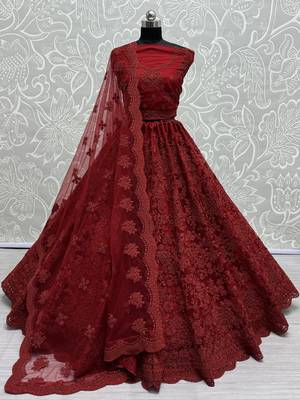 Captivating Maroon Dori Coded, Pattern Flower, and Thread Embroidered with Zircon Studded all over and Net Lehenga Choli 1