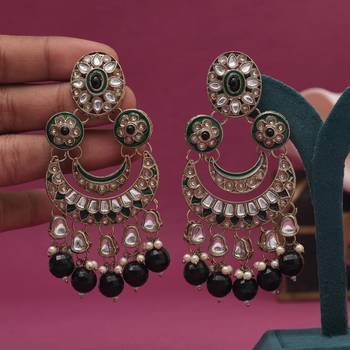 Black color kundan earrings 1