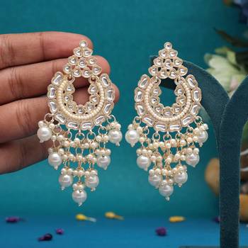 White color kundan earrings 1