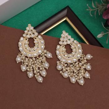 White color kundan earrings 2
