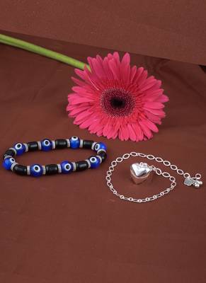 Handmade rakhi combo couple pair silver plated heart charm rakhi and blue evil eye unisex stretchable bracelet 3