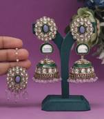 Light purple color kundan earrings with maang tikka