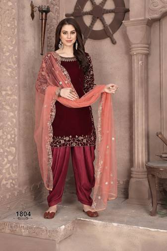 Maroon embroidered velvet Salwar suit