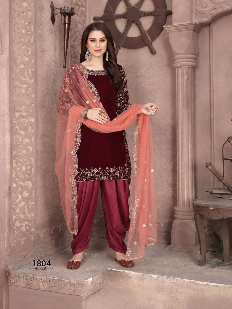 Maroon embroidered velvet Salwar suit