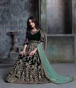 Dark green embroidered velvet semi stitched patiyala suit