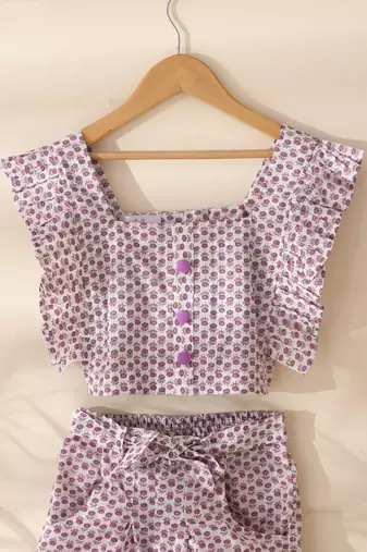 Girl's white printed top and shorts set