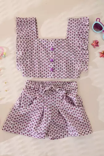 Girl's white printed top and shorts set