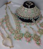 Mint green, baby pink designer premium bridal wear special jewellery