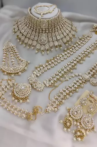 White designer premium bridal wear special jewellery