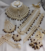 Maroon designer premium bridal wear special jewellery
