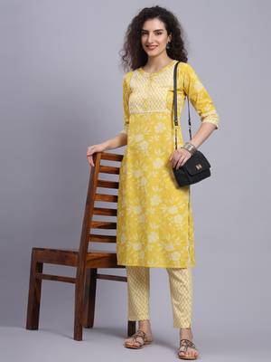 Largish cotton light yellow
 straight kurta with printed cotton trouser 1