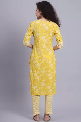 Largish cotton light yellow
 straight kurta with printed cotton trouser