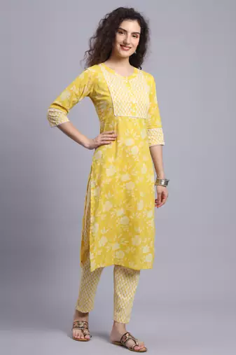 Largish cotton light yellow
 straight kurta with printed cotton trouser