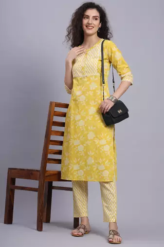 Largish cotton light yellow
 straight kurta with printed cotton trouser