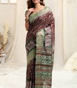 Maroon Cotton Kalamkari Ethnic Motifs Copper Zari Border Tassels Saree With Unstitched Blouse Piece